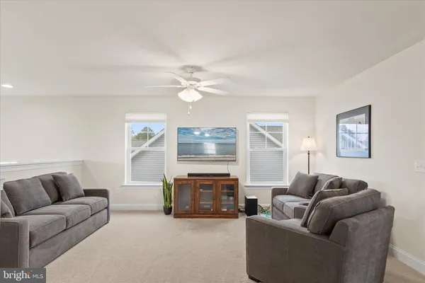 a view of house with backyard