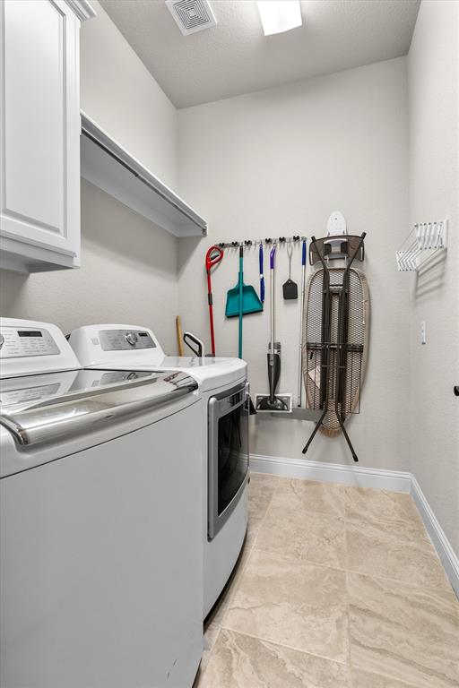 1024 Highpoint Way Roanoke, TX 76262 - Photo 10 of 29 Spacious utility room. Space for freezer or extra fridge.