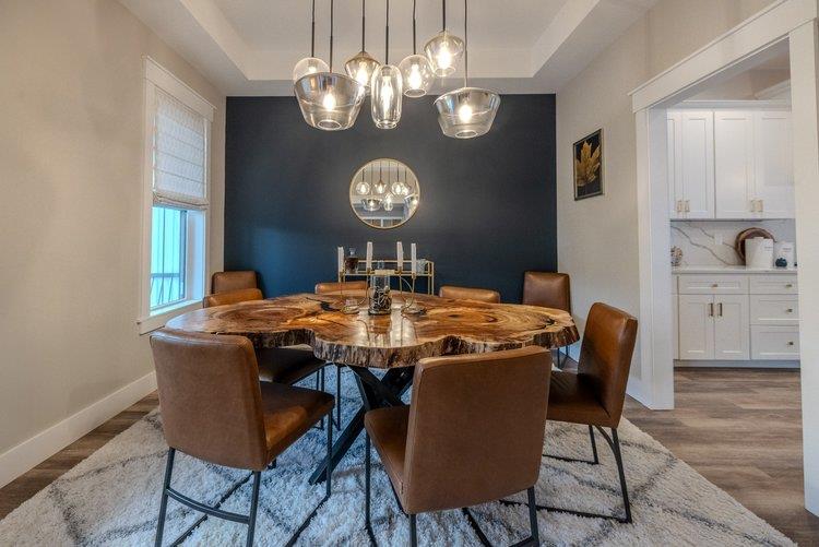 12370 Creamery Road Hopewell Junction, NY 12533 - Photo 7 of 26 Dining area with a tray ceiling and hardwood / wood-style floors