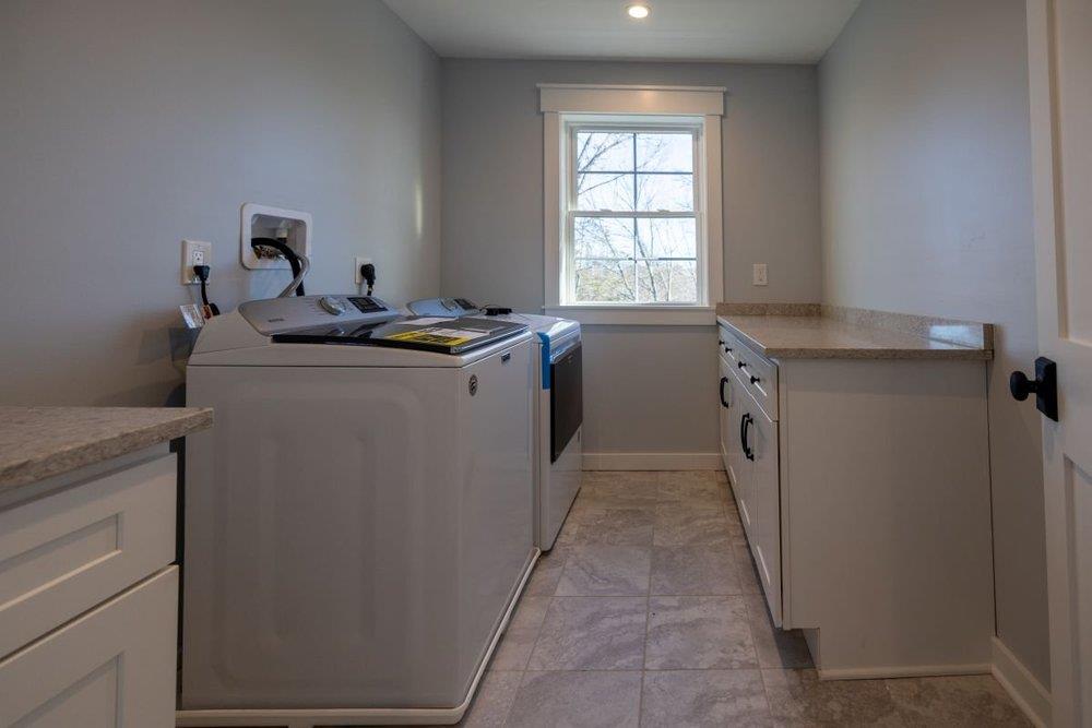 12370 Creamery Road Hopewell Junction, NY 12533 - Photo 10 of 26 Clothes washing area featuring cabinets and washer and dryer