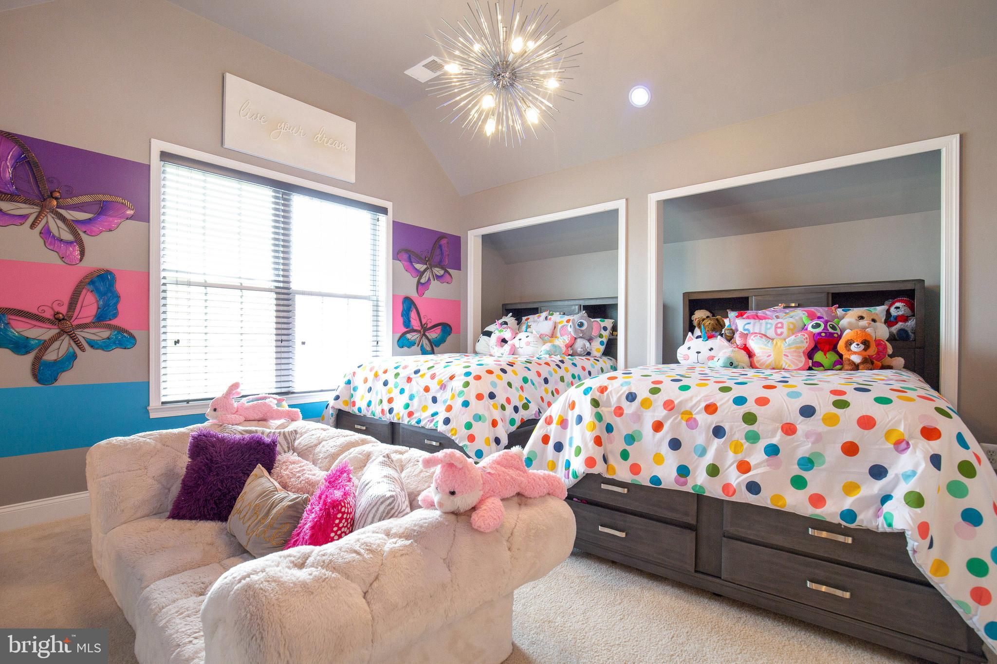 4201 Rolling Paddock Drive Upper Marlboro, MD 20772 - Photo 39 of 62 a bedroom with two beds and a large window