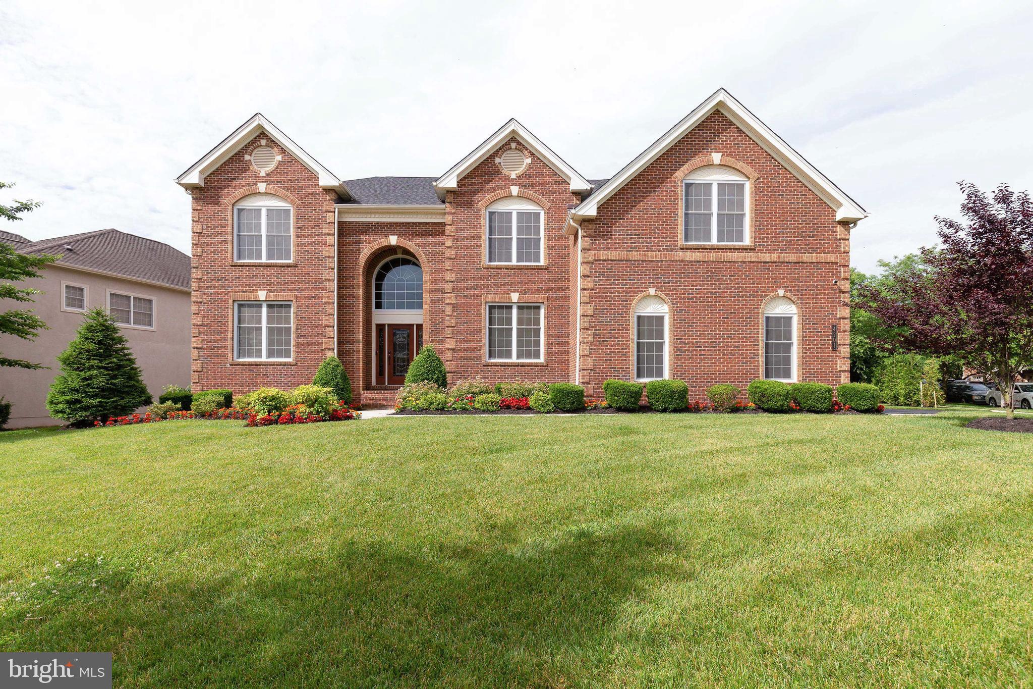 4201 Rolling Paddock Drive Upper Marlboro, MD 20772 - Photo 4 of 62 front view of a house with a yard