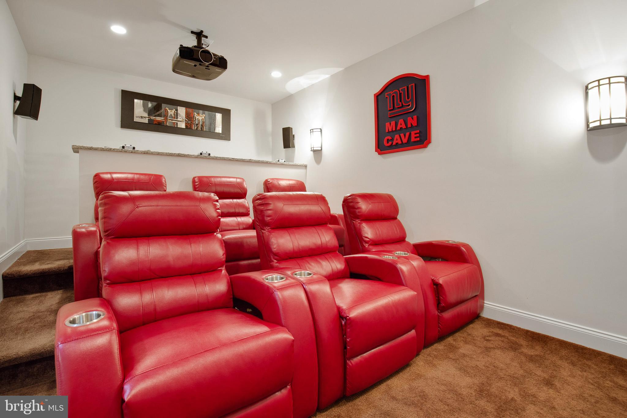4201 Rolling Paddock Drive Upper Marlboro, MD 20772 - Photo 49 of 62 a projector room with a bed and a couch