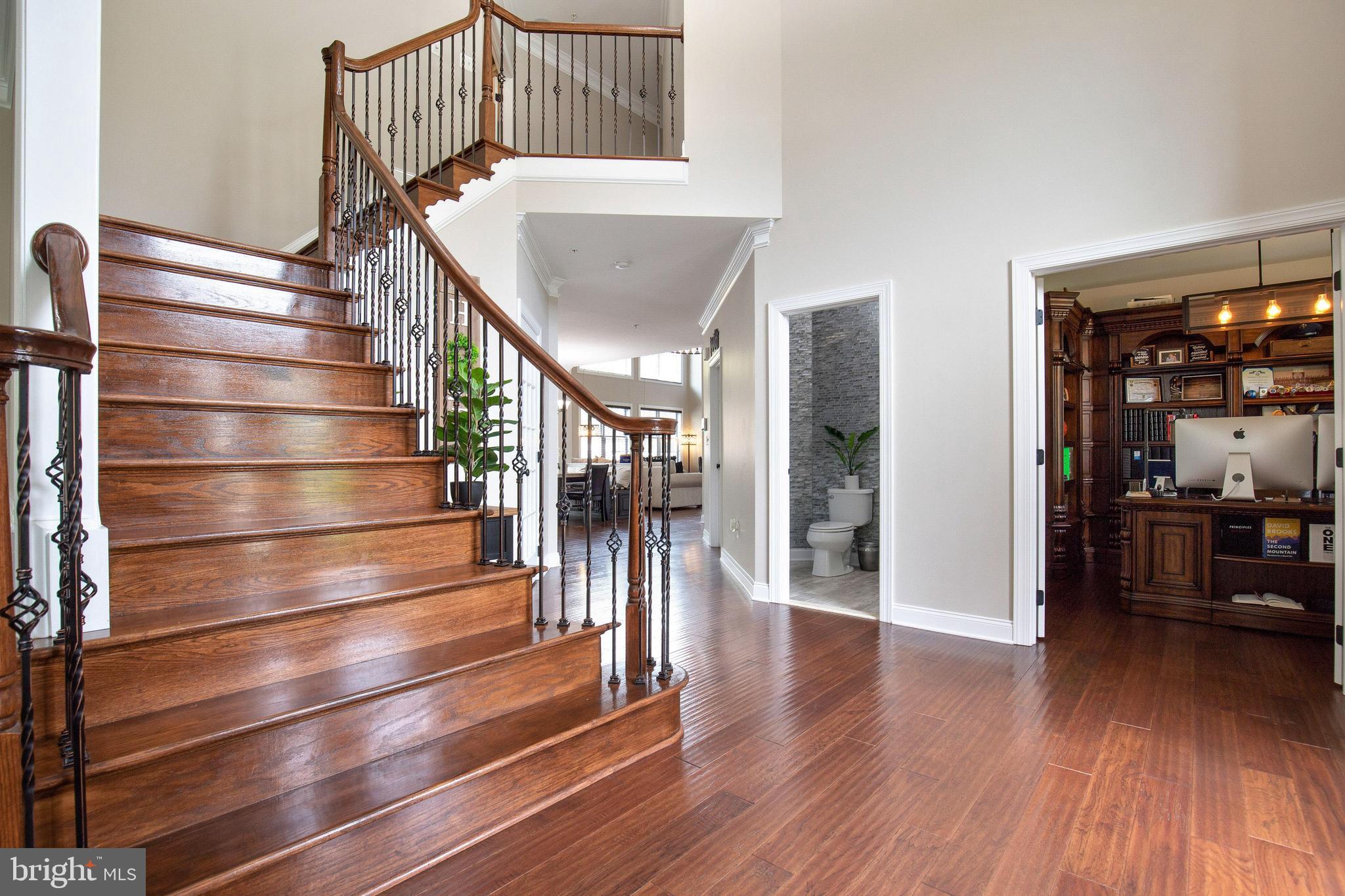 4201 Rolling Paddock Drive Upper Marlboro, MD 20772 - Photo 5 of 62 a view of entryway and hall with wooden floor