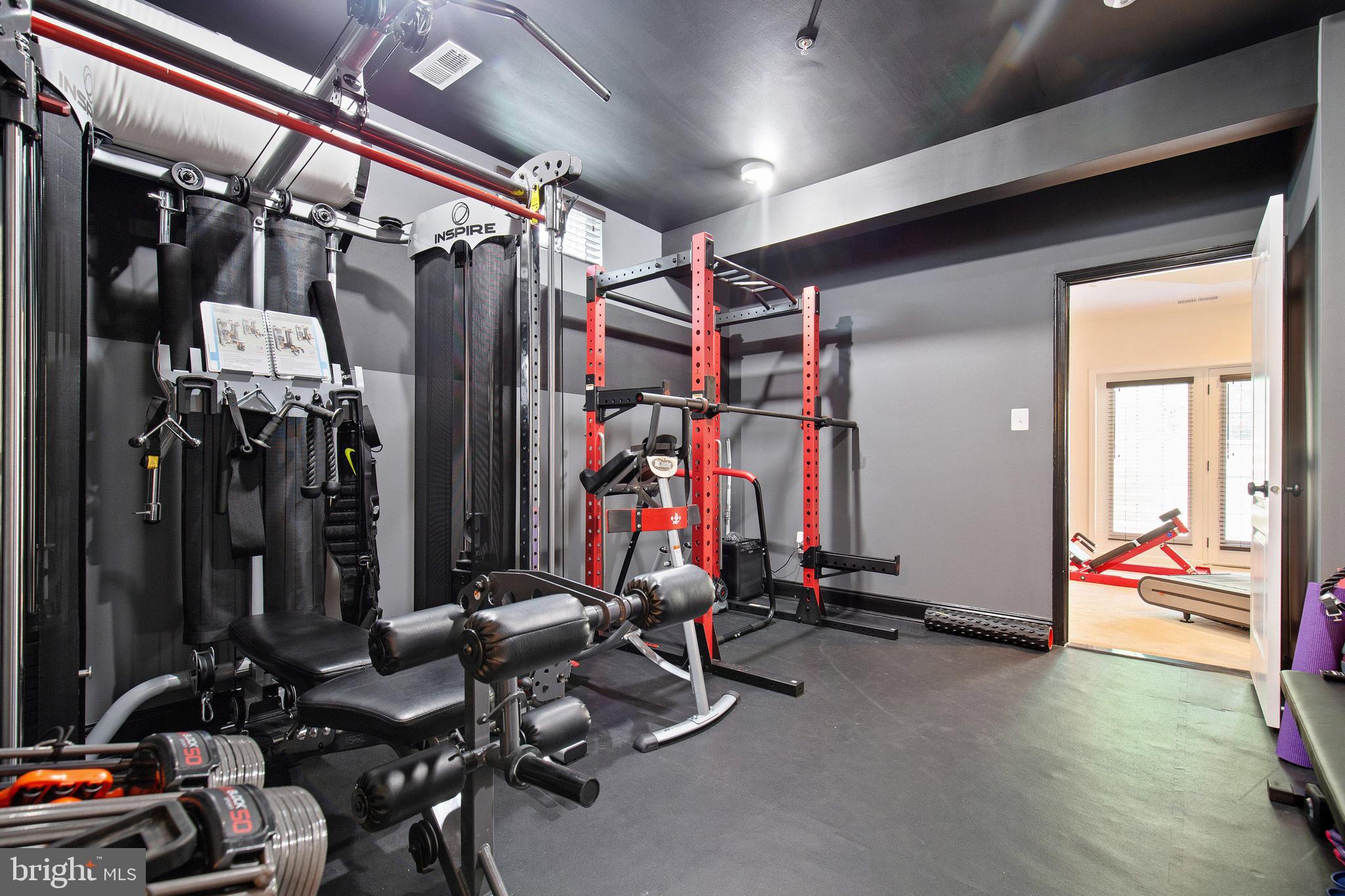 4201 Rolling Paddock Drive Upper Marlboro, MD 20772 - Photo 54 of 62 a view of a room with gym equipment
