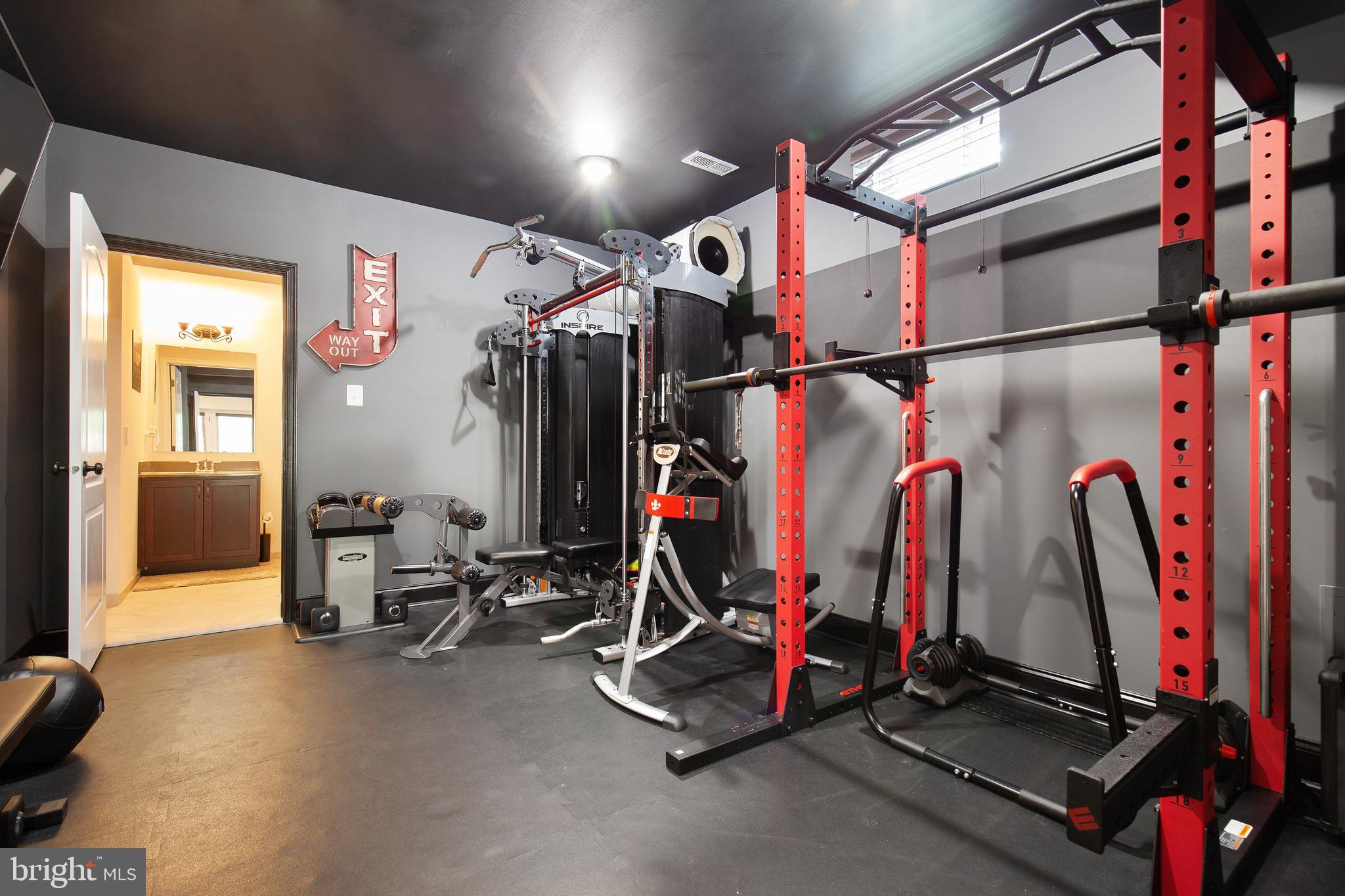4201 Rolling Paddock Drive Upper Marlboro, MD 20772 - Photo 55 of 62 a view of a room with gym equipment