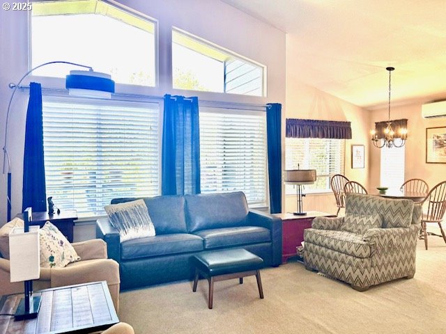 15 Mariners Lane Florence, OR 97439 - Photo 22 of 40 a living room with furniture and a large window