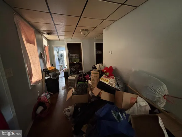 a view of a room with furniture air conditioner and window