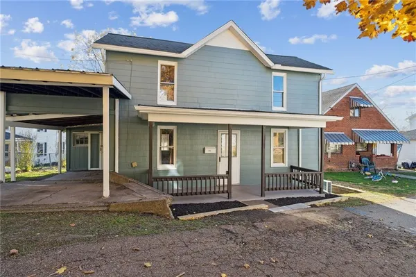 a view of a house with a porch