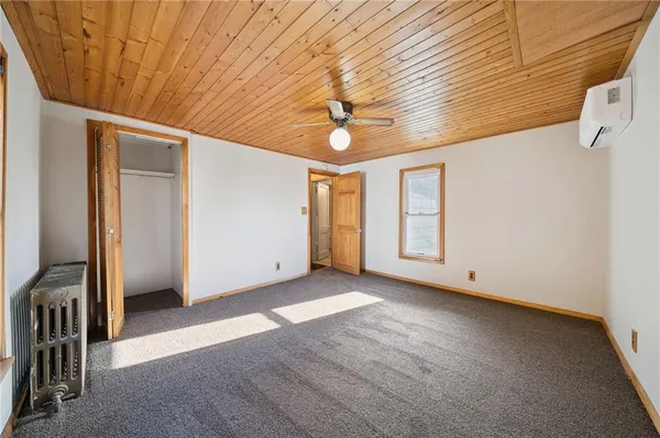a view of livingroom with hardwood floor and ceiling fan