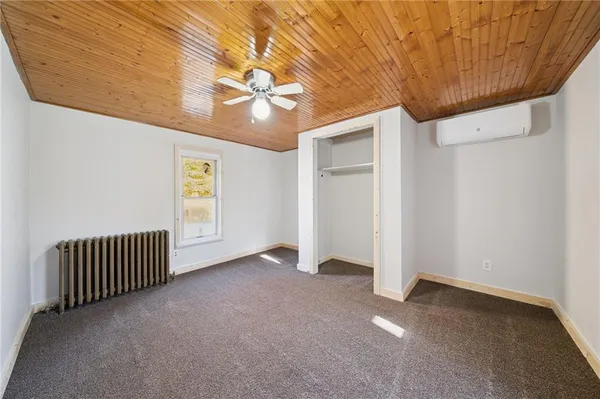 en empty room with windows