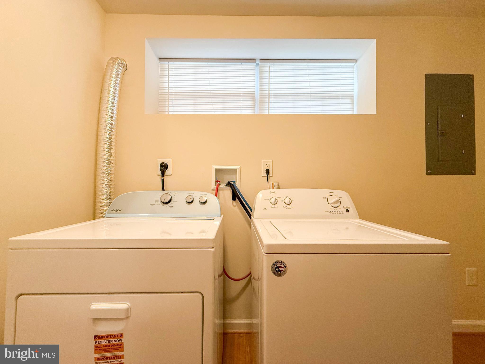 3511 Orchard Shade Road Randallstown, MD 21133 - Photo 13 of 27 a utility room with dryer and washer