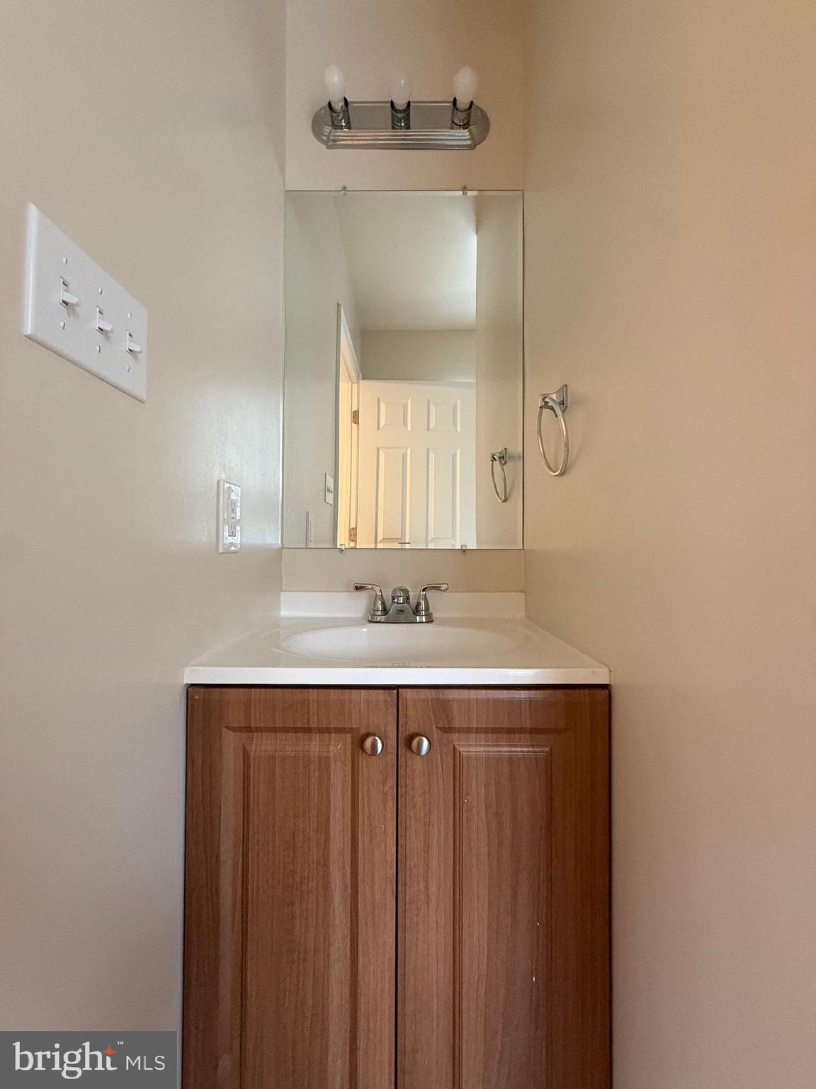 3511 Orchard Shade Road Randallstown, MD 21133 - Photo 18 of 30 a bathroom with a sink and a mirror
