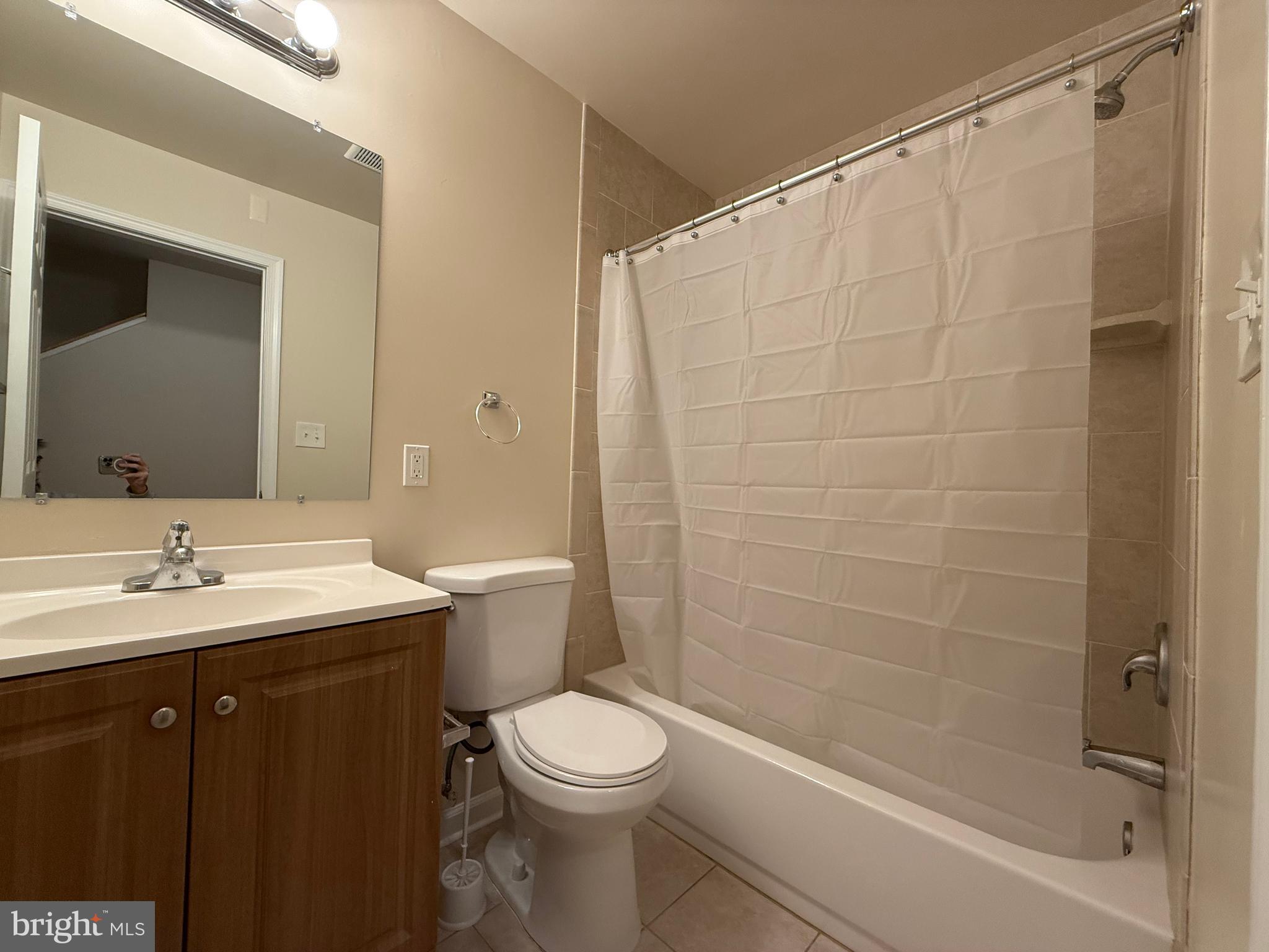 3511 Orchard Shade Road Randallstown, MD 21133 - Photo 28 of 30 a bathroom with a sink a toilet and shower