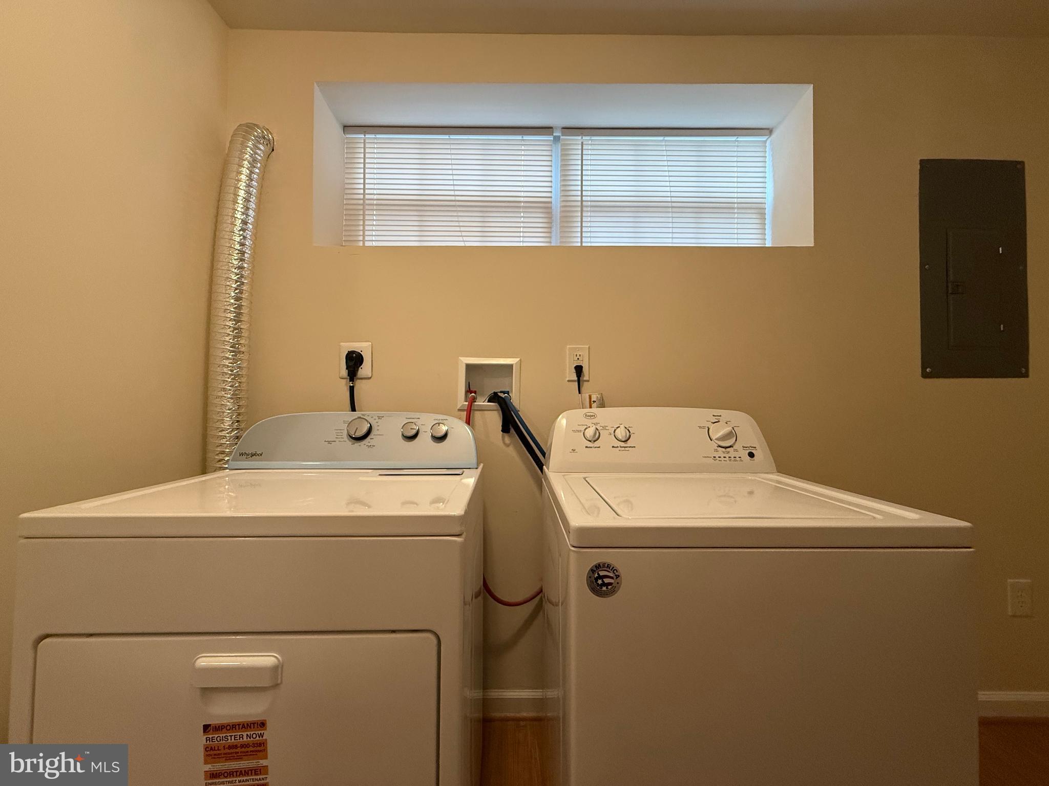 3511 Orchard Shade Road Randallstown, MD 21133 - Photo 30 of 30 a utility room with dryer and washer