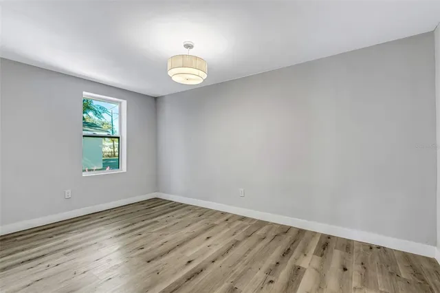 a bathroom with a toilet and a bathtub