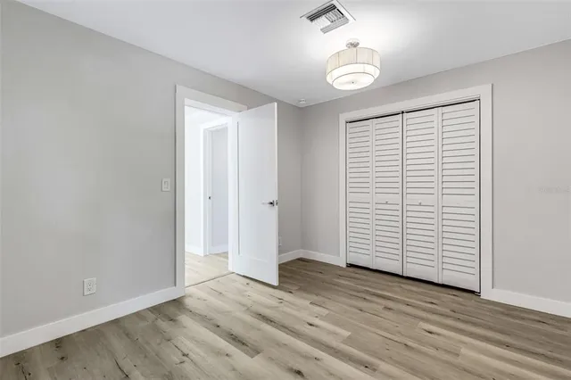 a view of a backyard with sitting area