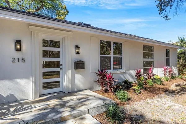 a house view with a garden space
