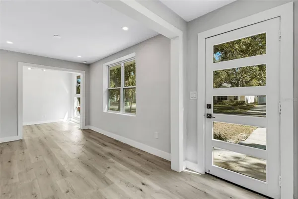 a kitchen with a sink and a window