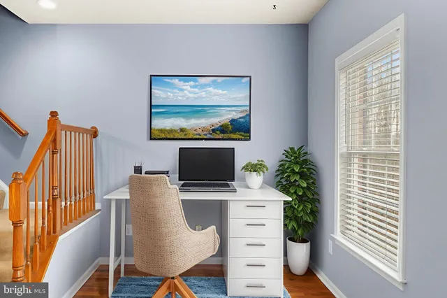 a view of a kitchen with a sink and a kitchen