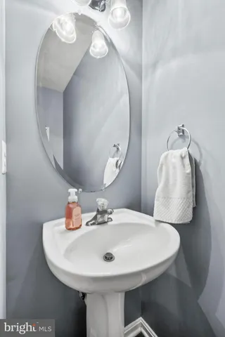 a kitchen with granite countertop stainless steel appliances and wooden cabinets