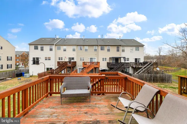 a view of a chairs and table on the terrace