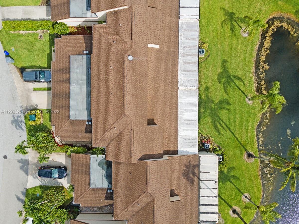 20843 Boca Ridge Drive North Boca Raton, FL 33428 - Photo 2 of 22 an aerial view of a house with a garden