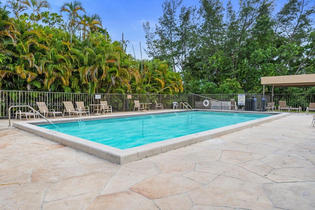20843 Boca Ridge Drive North Boca Raton, FL 33428 - Photo 21 of 22 a view of outdoor space yard and swimming pool