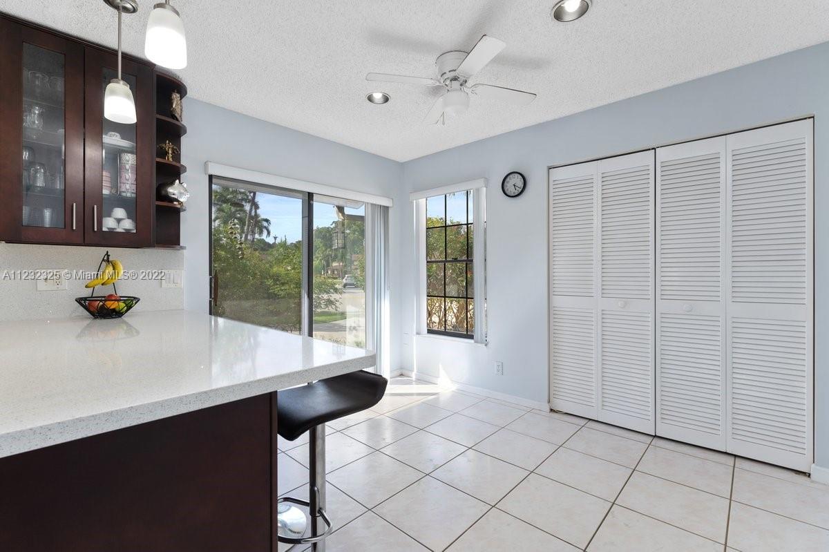 20843 Boca Ridge Drive North Boca Raton, FL 33428 - Photo 8 of 22 a room with pool table and windows