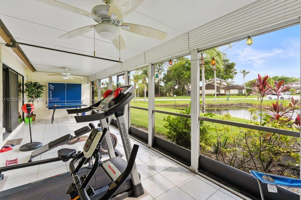 20843 Boca Ridge Drive North Boca Raton, FL 33428 - Photo 9 of 22 a view of a room with gym equipment