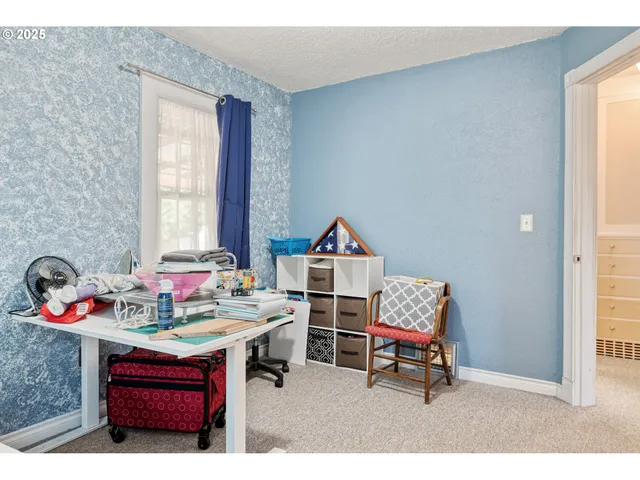 a living room with a couch and a table