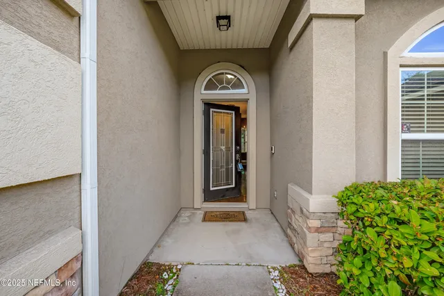 a view of a hallway with a entryway