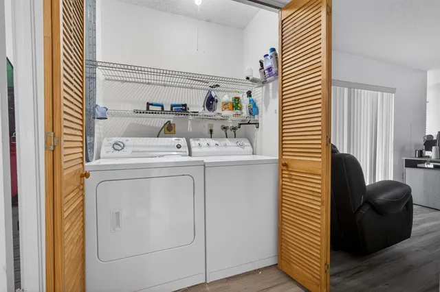 a utility room with dryer and washer