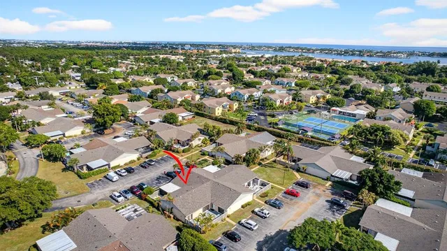 a view of a backyard with a garden and plants