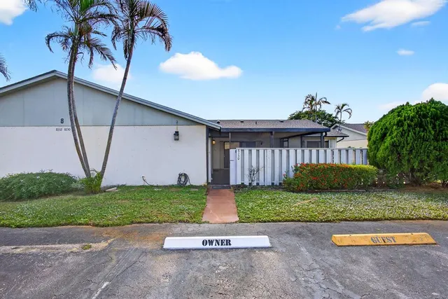 a sign broad on the side of the road