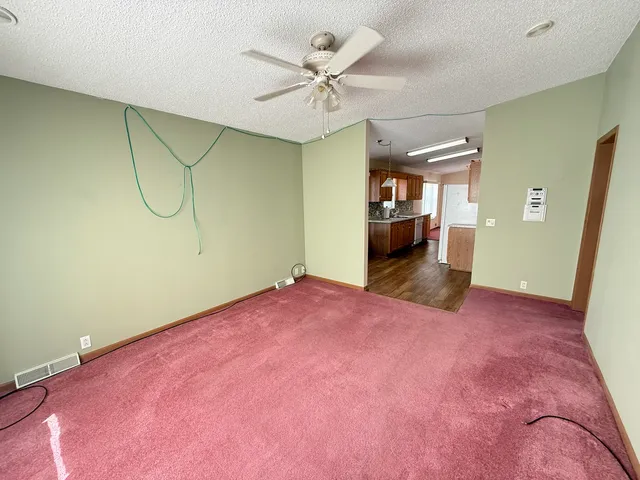 a view of storage and utility room with washer and dryer