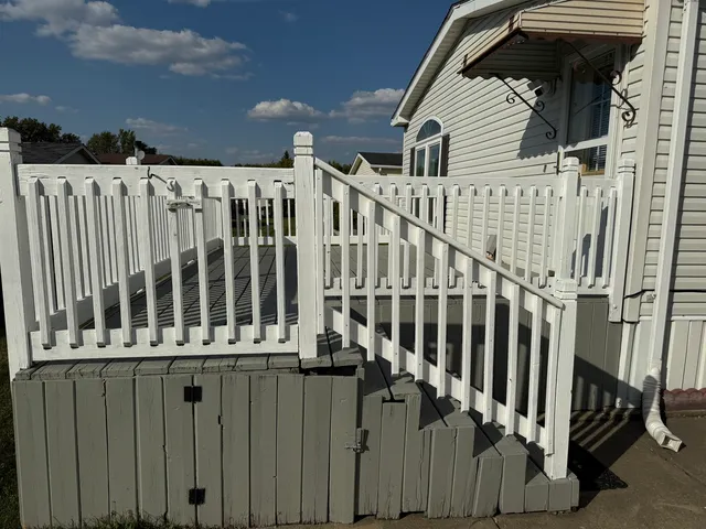 a balcony with view of car parked