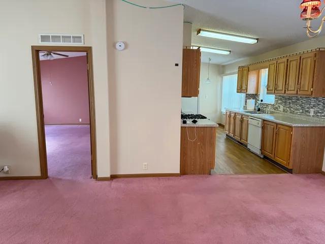 an empty room with a bathroom