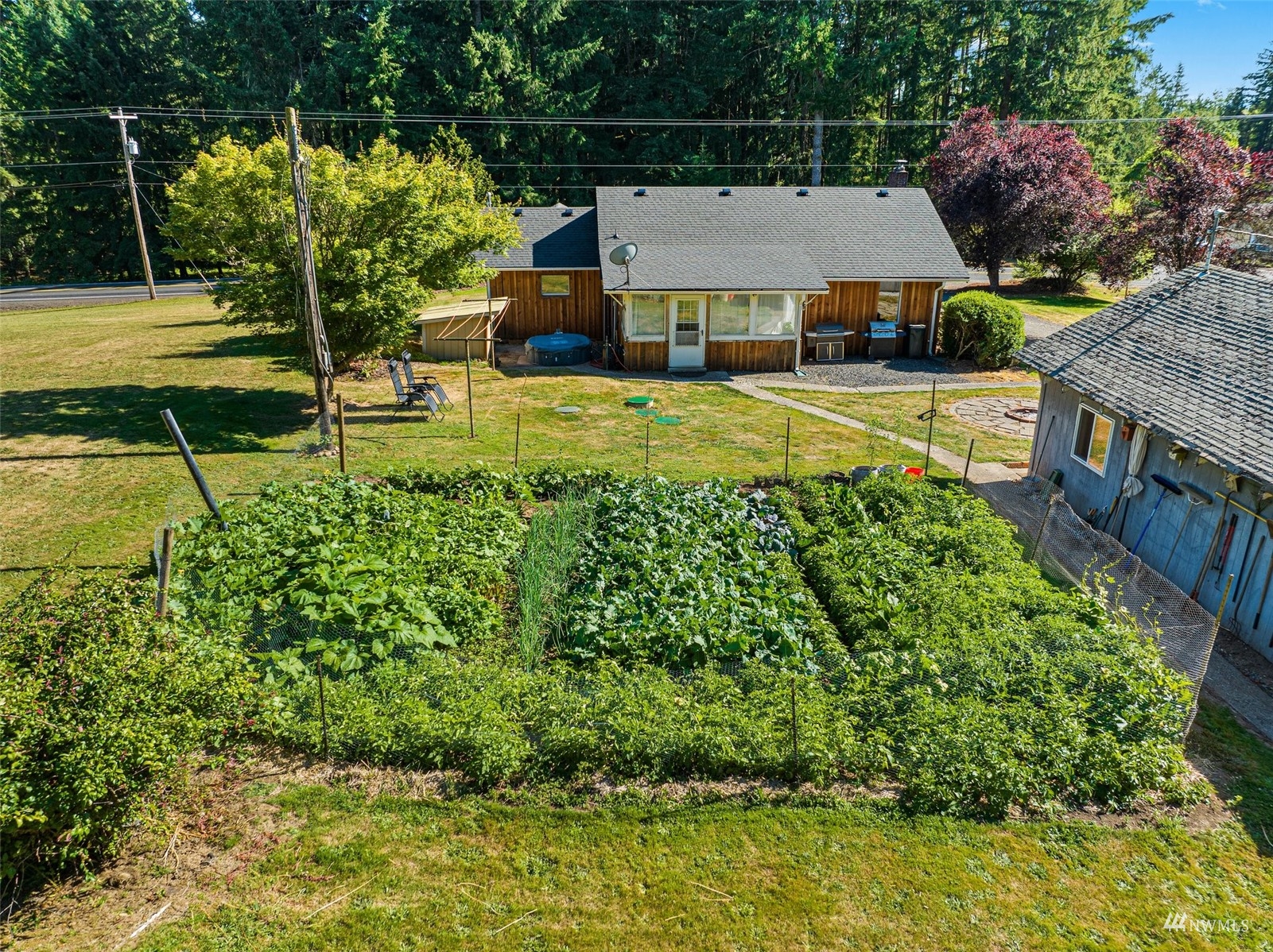 342 Chilvers Road Chehalis, WA 98532 - Photo 5 of 31 a aerial view of a house with swimming pool and next to a yard