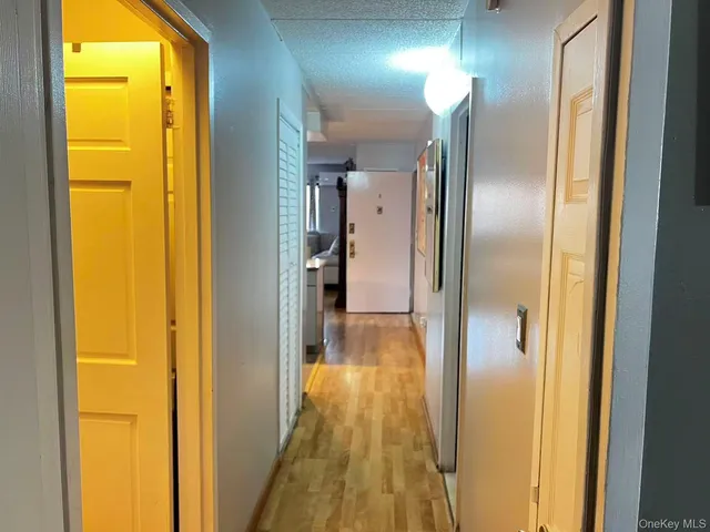 a view of a bathroom from a hallway