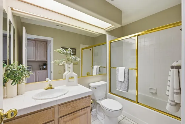 a front view of a house with sitting area