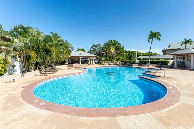 a view of a swimming pool with an outdoor space