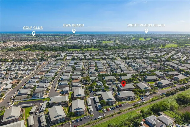 an aerial view of residential building with city view