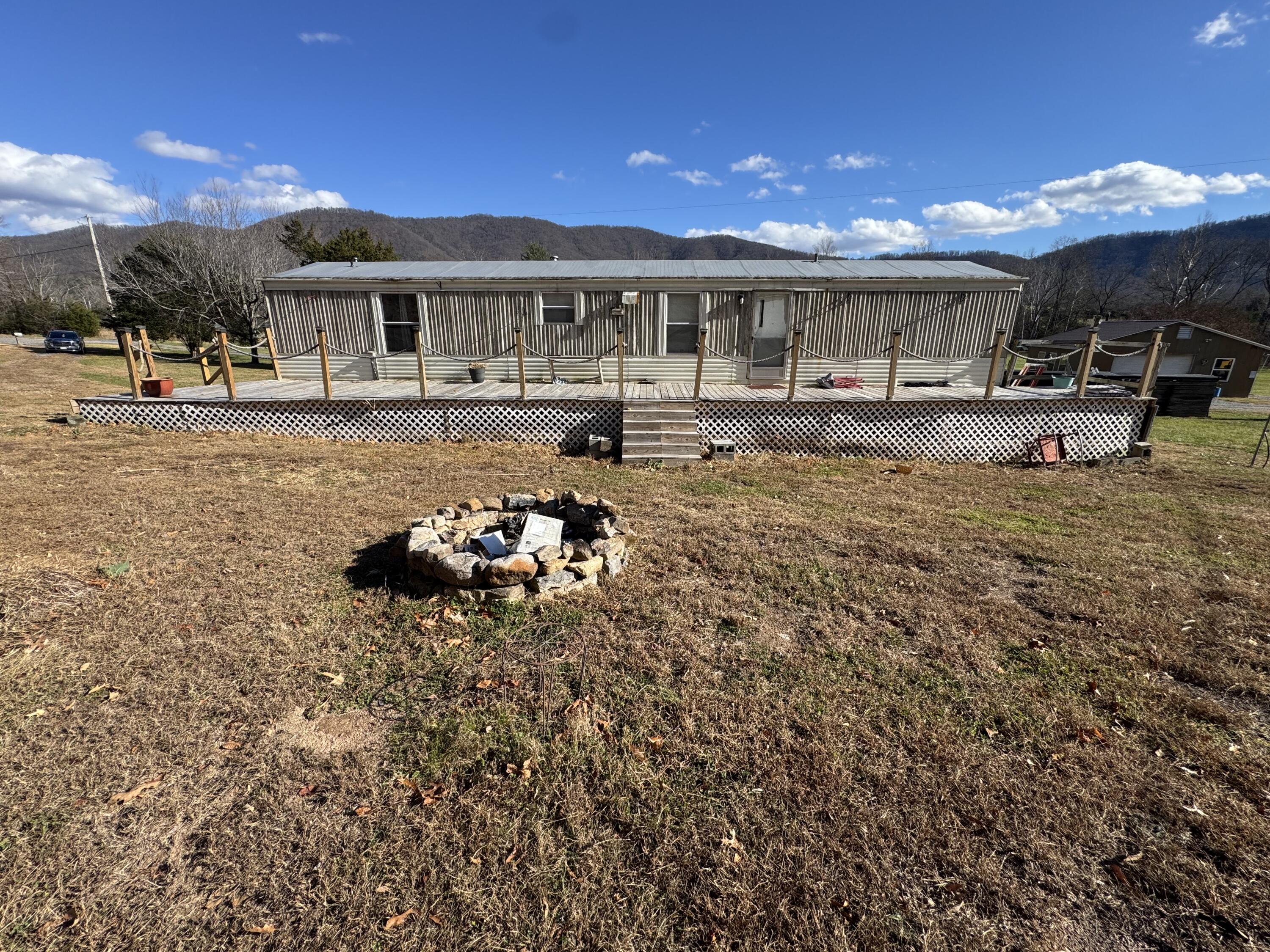 1333 Falling Leaf Lane Montvale, VA 24122 - Photo 2 of 7 a large building with swimming pool in front of it