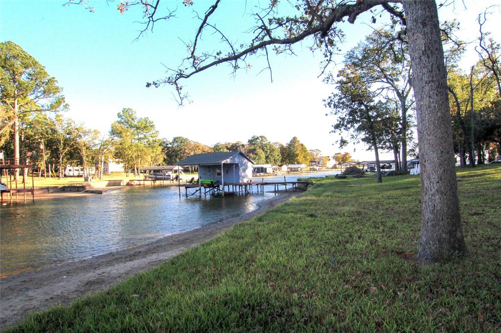 6928 Scott Street Eustace, TX 75124 - Photo 32 of 37 a view of a lake with houses