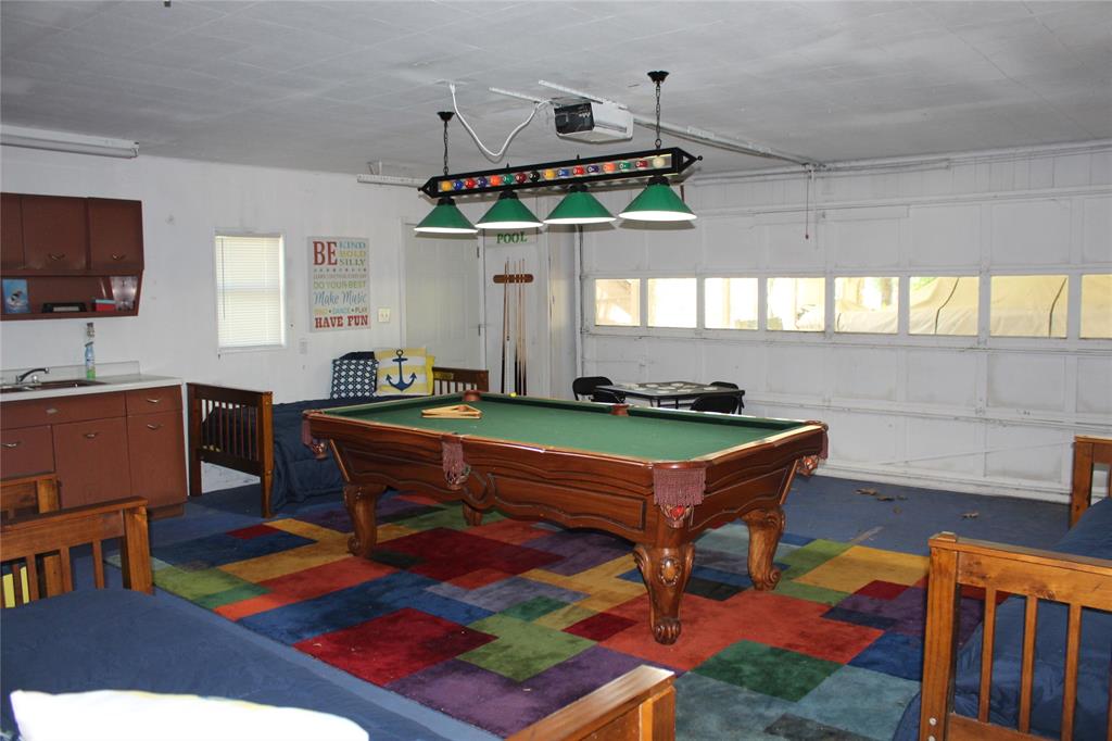 6928 Scott Street Eustace, TX 75124 - Photo 34 of 37 a room with pool table and windows
