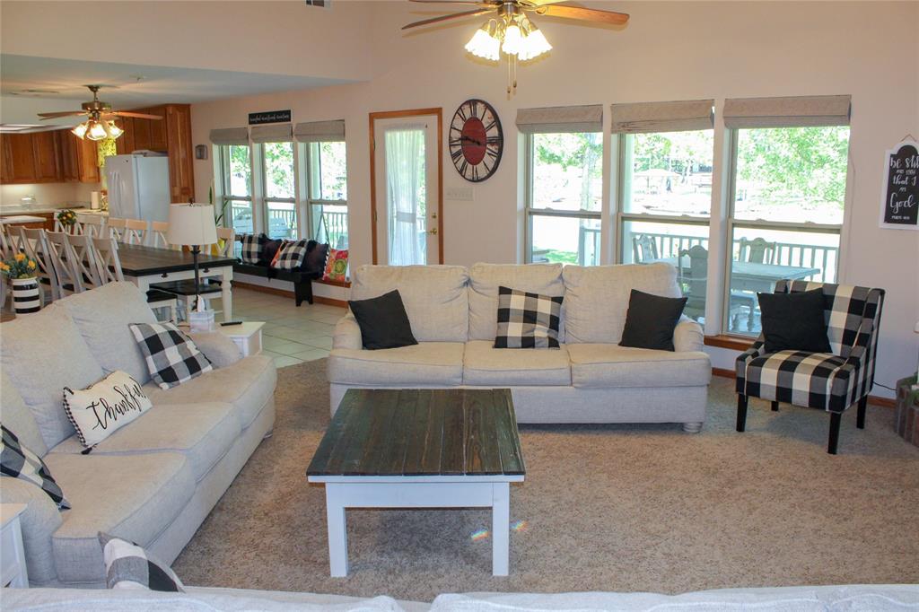 6928 Scott Street Eustace, TX 75124 - Photo 9 of 37 a living room with furniture and a large window