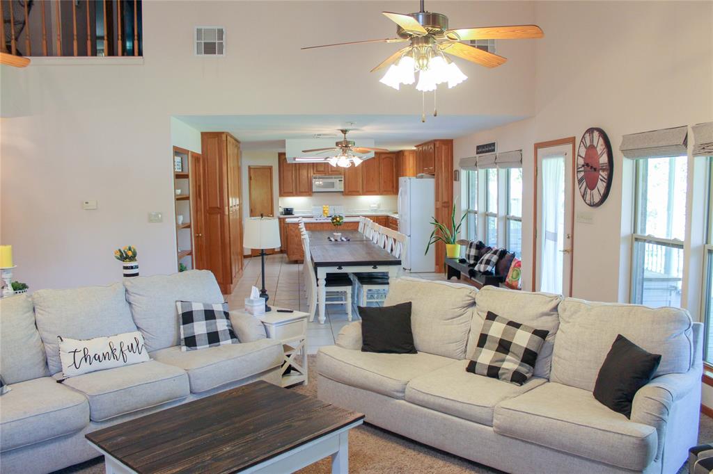 6928 Scott Street Eustace, TX 75124 - Photo 10 of 37 a living room with furniture and a large window