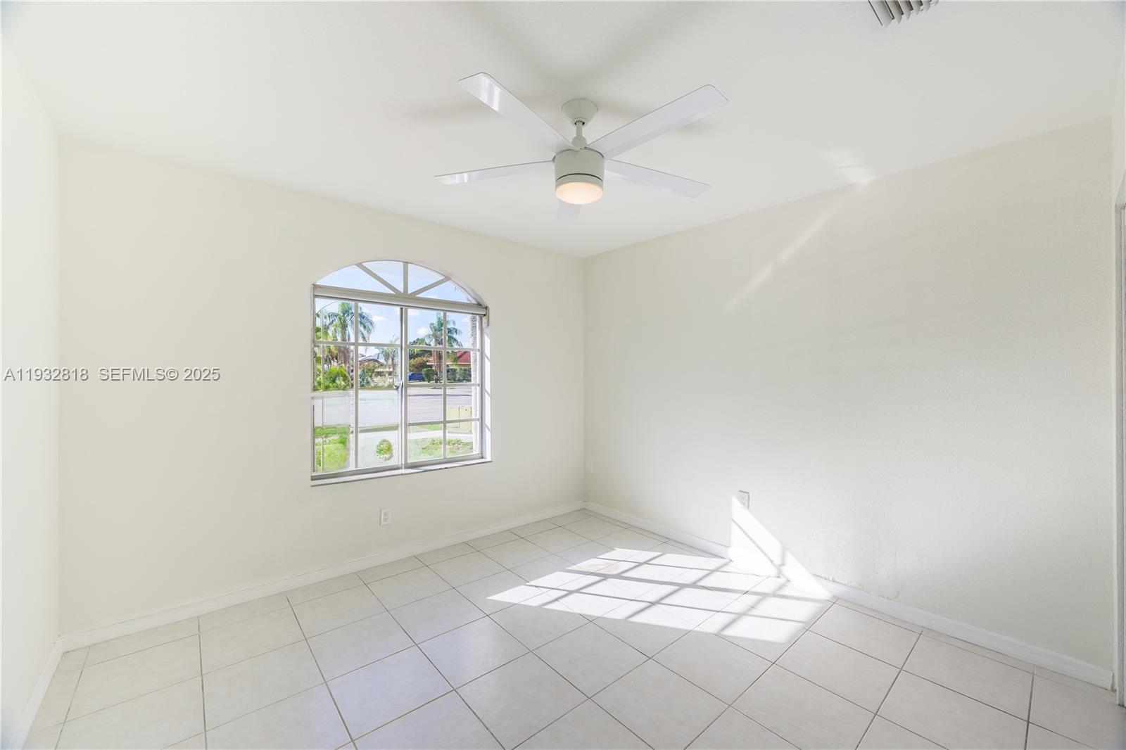 13797 Southwest 154th Street Miami, FL 33177 - Photo 13 of 14 a view of livingroom with window