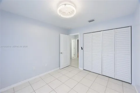 a view of a room with an empty space
